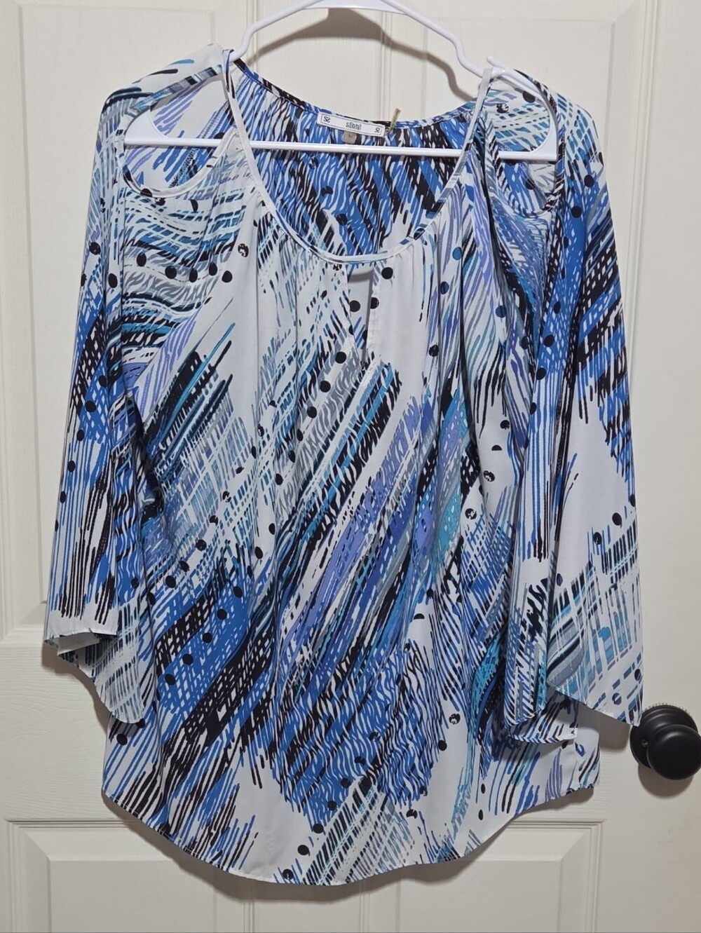 blue/white/black shoulderless blouse